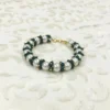 Chic Green and White Beaded Bracelet with Gold-Tone Accents