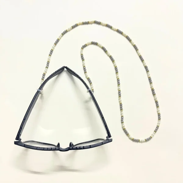 Chic Grey and White Beaded Eyeglass Chain with Gold Accents