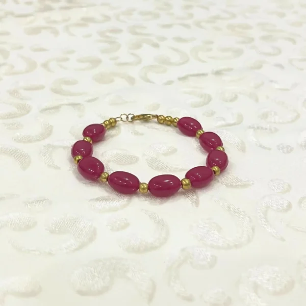 Chic Magenta Oval Bead Bracelet with Gold-Tone Accents