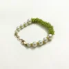 Chic Peridot Bead Bracelet with Pearl Embellishments and Gold-Toned Clasp