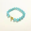 Chic Sky Blue Beaded Bracelet with Golden Star Accents