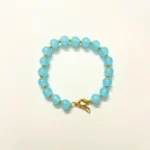 Chic Sky Blue Beaded Bracelet with Golden Star Accents