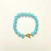 Chic Sky Blue Beaded Bracelet with Golden Star Accents