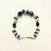 Dark Blue Onyx Bracelet with Pearl Embellishments and Gold-Tone Accents