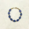 Elegant Blue Oval Bead Bracelet with Gold Accents