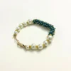 Elegant Pearl and Blue Bead Embellished Bracelet with Gold-Toned Clasp