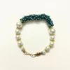 Elegant Pearl and Blue Bead Embellished Bracelet with Gold-Toned Clasp