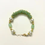 Elegant Pearl and Light Green Oval Bead Bracelet with Gold-Tone Accents